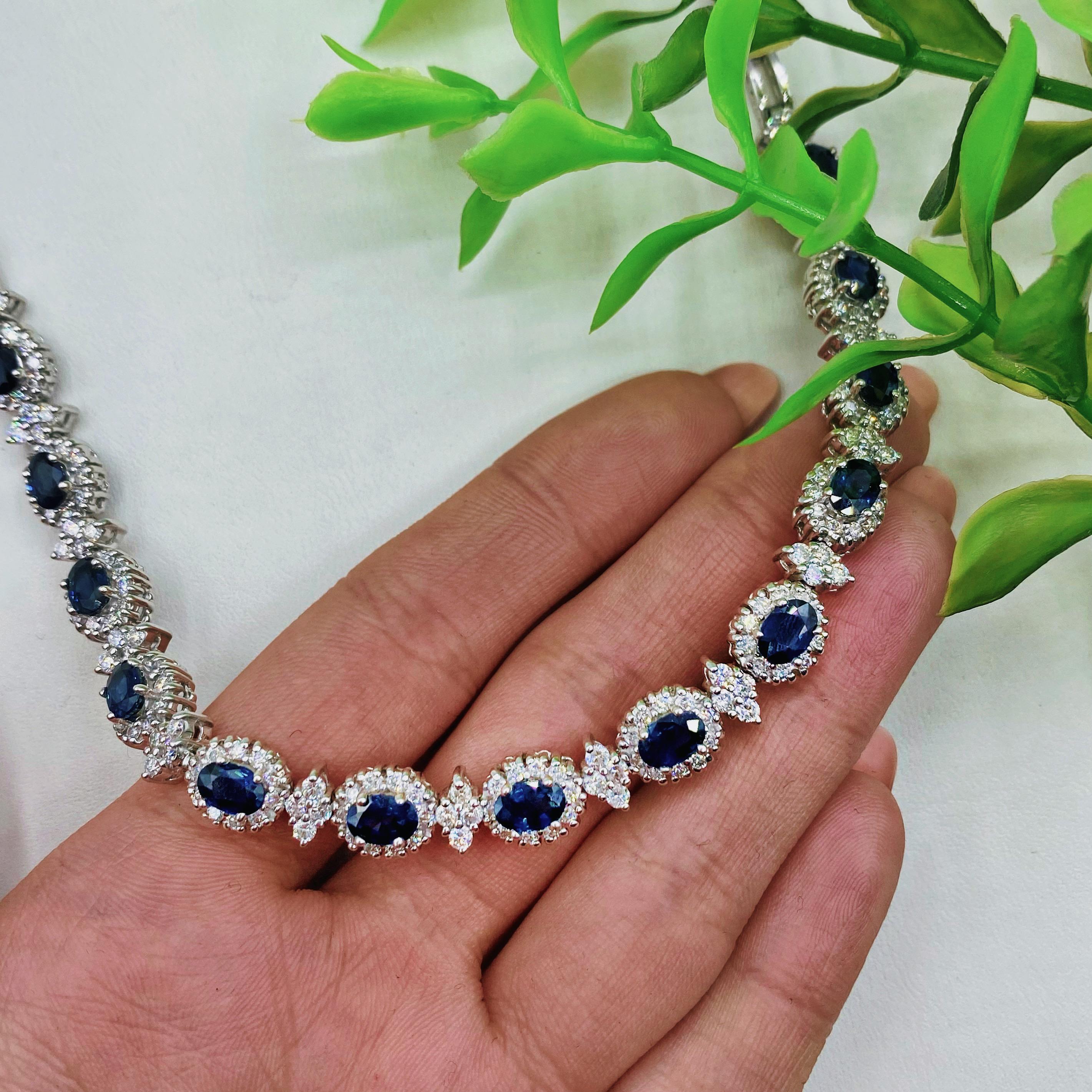 14kt white gold necklace
4.00ct total weight diamonds
9.00ct total Sapphires
Round brilliant cut diamonds
Color/Clarity: F/G-VS2/SI1
17.50