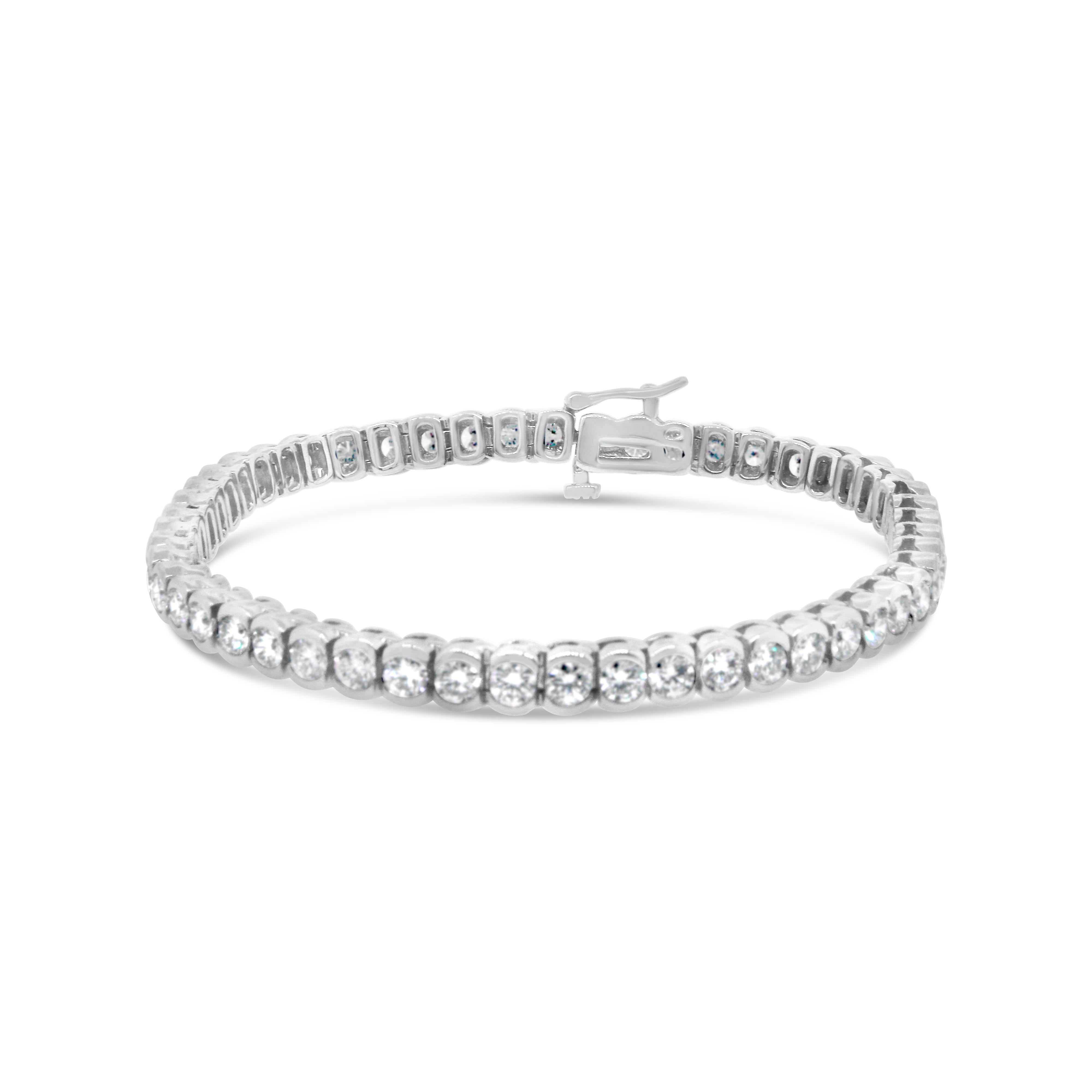 14k White Gold
Diamond: 6 ct twd (estimated)
Color: G-H
Clarity: SI
Total Weight: 21.3 grams
Length: 7 inches