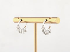 Orecchini a cerchio Huggie con diamante pendente in oro bianco 14KT