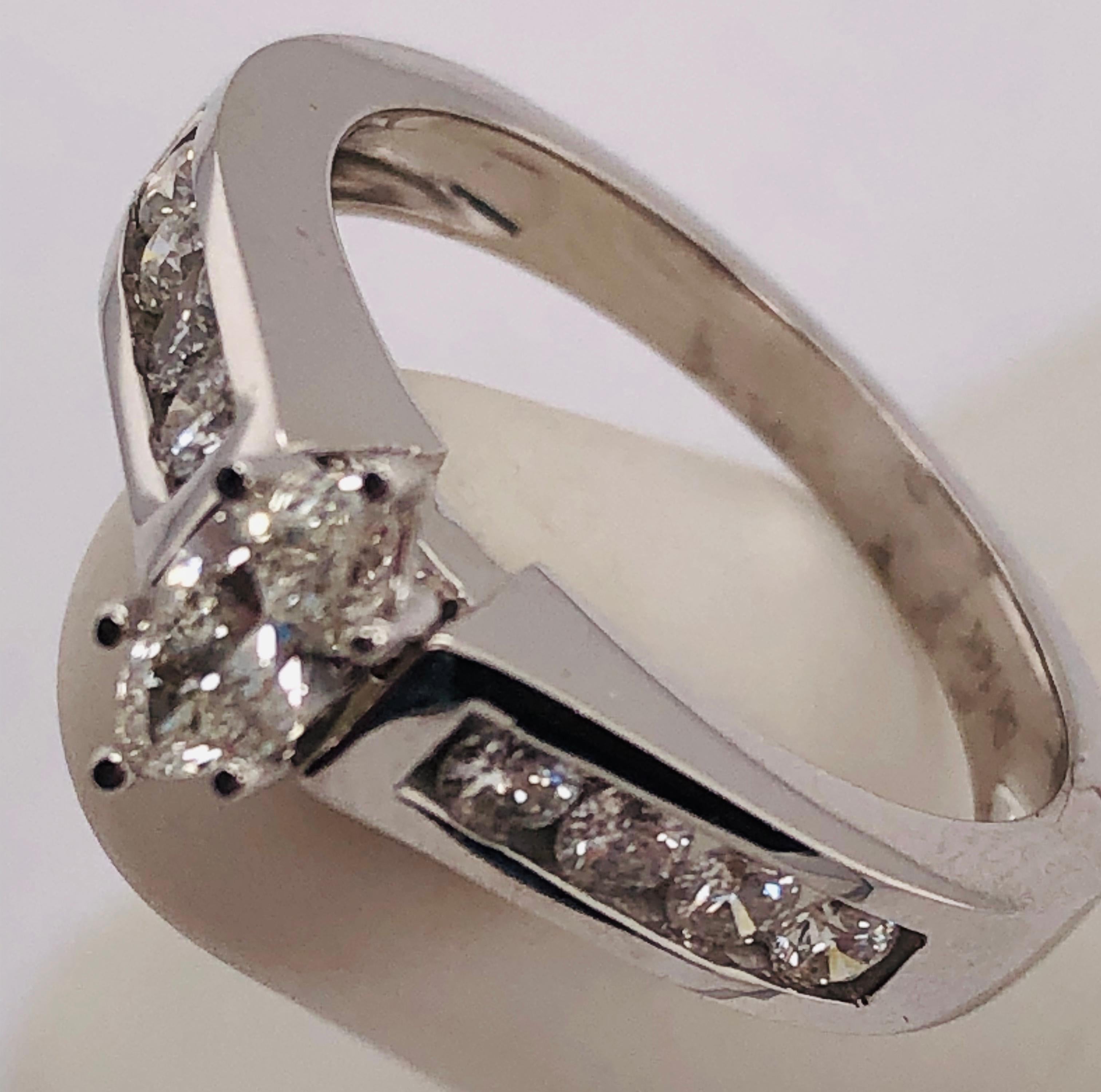 14Kt White Gold Diamond Engagement Bridal Ring 
1.20 Total Diamond Weight
Size 6.75 
4 grams total weight