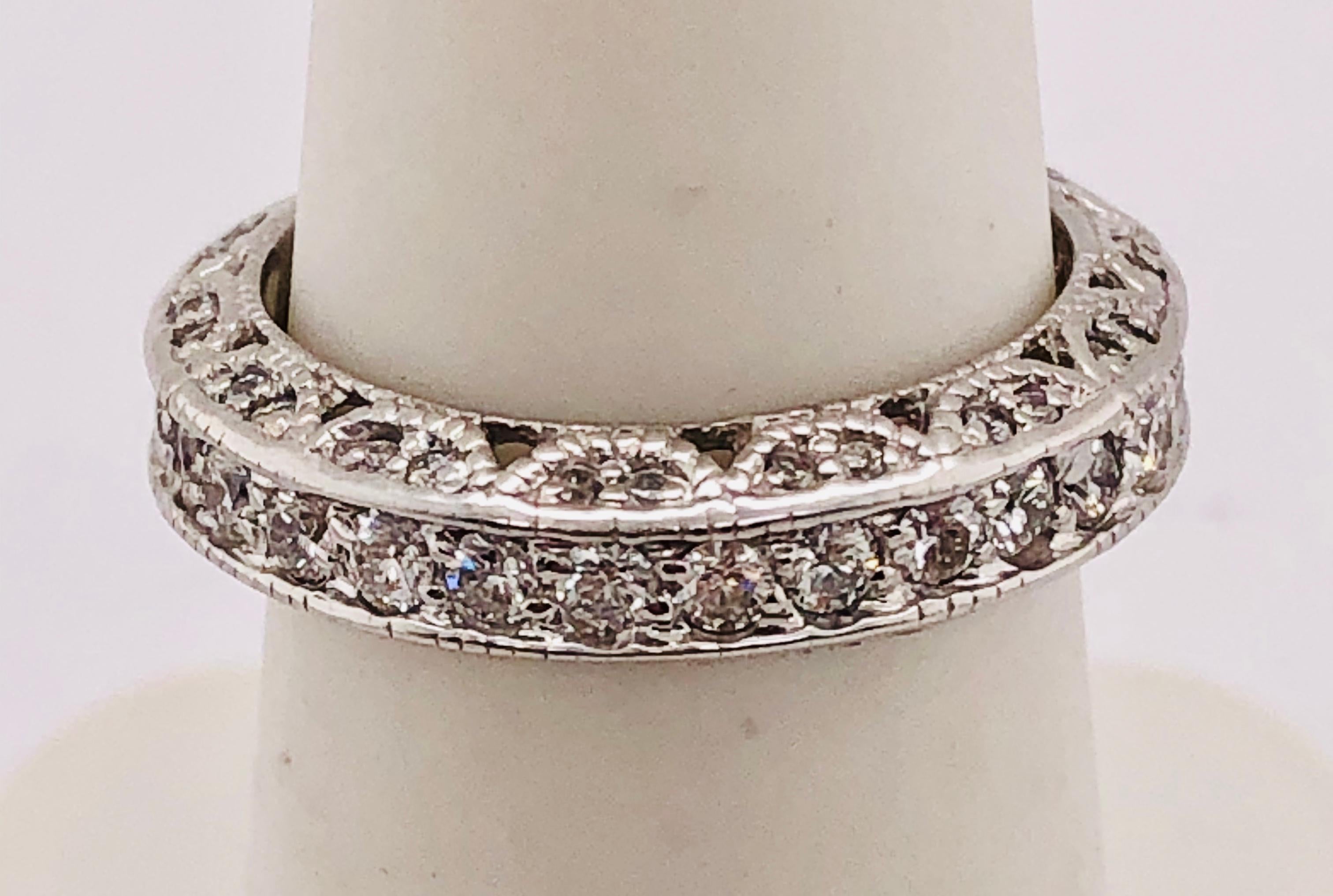 14Kt White Gold Diamond Eternity Anniversary Ring Wedding Band 2.00 Total Diamond Weight.
Size 5 
5.28 grams Total Weight.