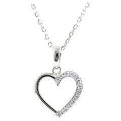 Collana con ciondolo a cuore aperto con pave di diamanti in oro bianco 14KT