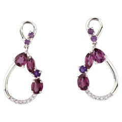 Orecchino a goccia aperto in oro bianco 14KT con diamante, rodolite e ametista