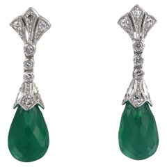 14kt white gold earrings set with green onyx and single cut diamond total 0.34ct