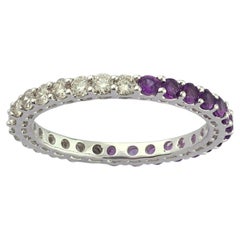 Elegante fede nuziale “Eternity” in oro bianco 14KT con ametista e diamanti