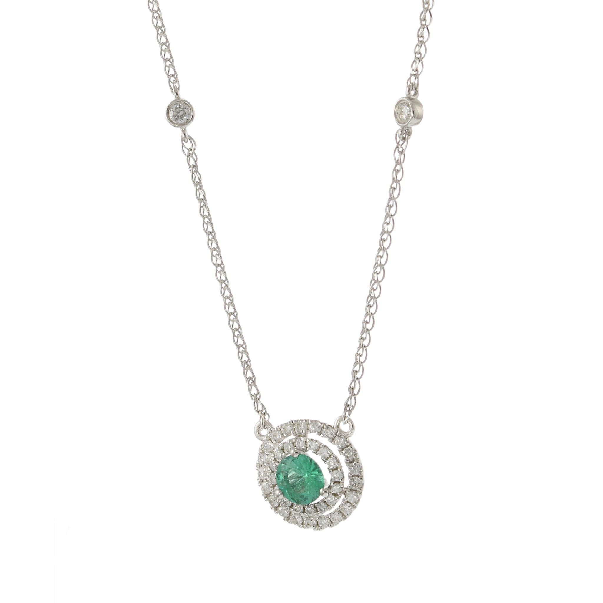 Modern 14KT White Gold Emerald and Diamond Halo Necklace For Sale