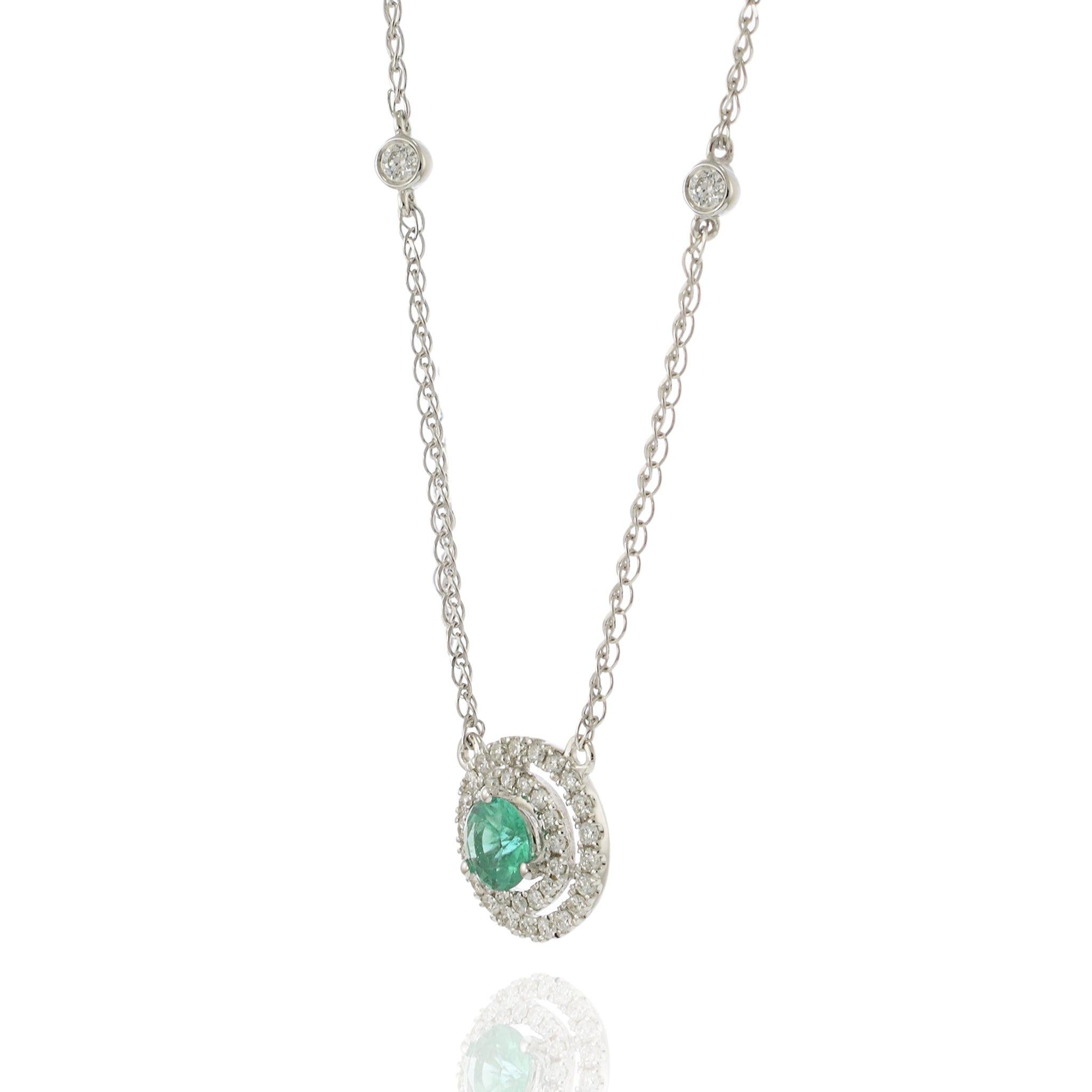 14KT White Gold Emerald and Diamond Halo Necklace In New Condition For Sale In New York, NY