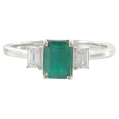 14KT White Gold Emerald and Diamond Three-Stone Ring