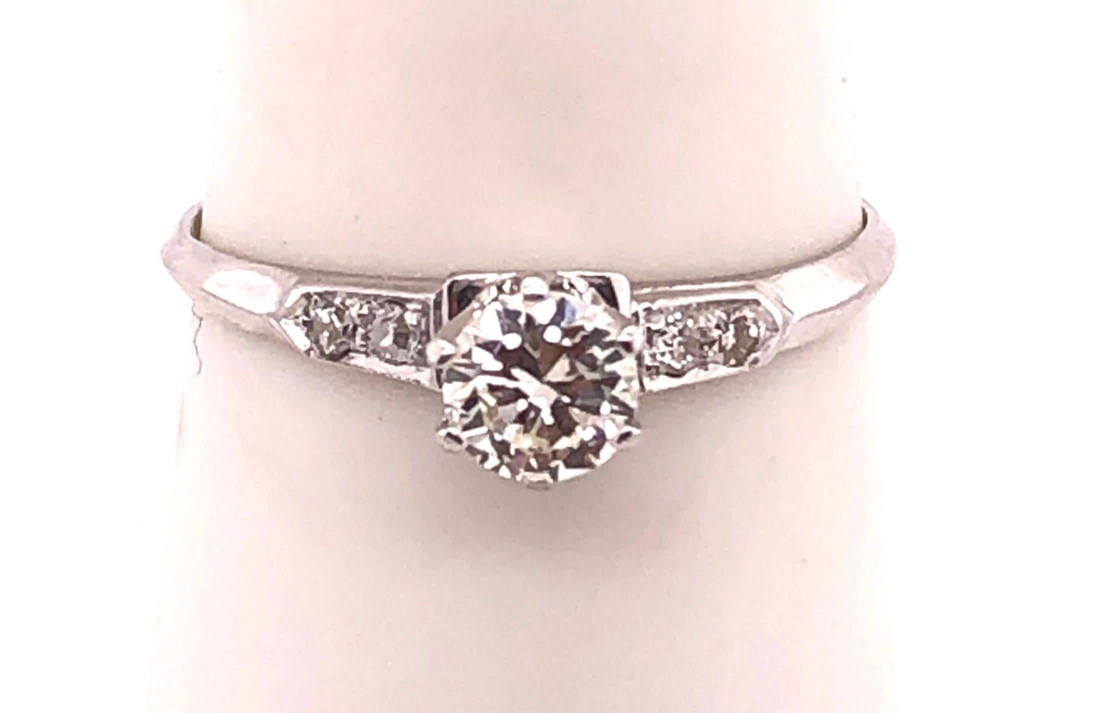 14Kt White Gold Engagement Ring 0.38 Total Diamond Weight
size 7.5 with 1.46 grams total weight