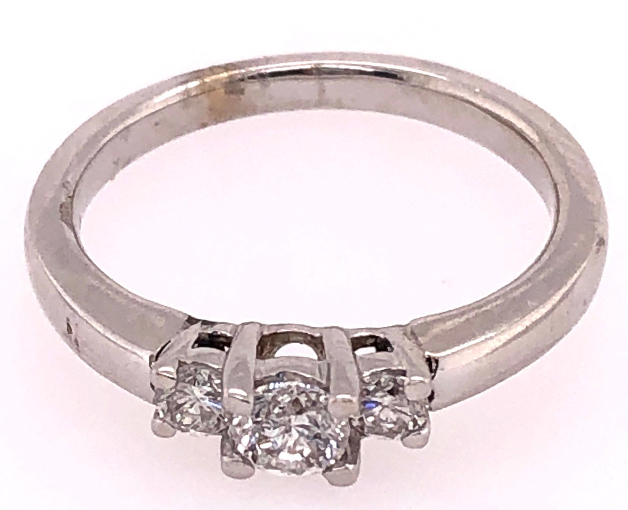 14Kt White Gold Engagement Ring/Band Ring 0.50 Total Diamond Weight
Size 6.75 with 3.7 grams Total Weight.