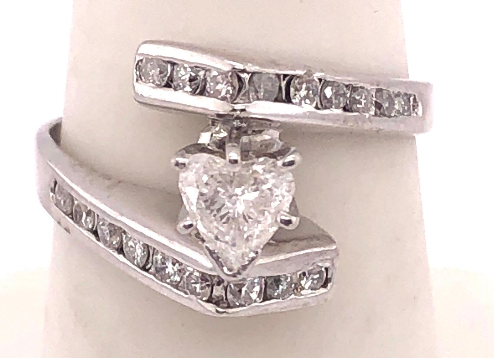 bague de fiançailles en or blanc 14Kt /Bague de mariage 1.00 Poids total des diamants.
Taille 7 avec un poids total de 4,86 grammes
