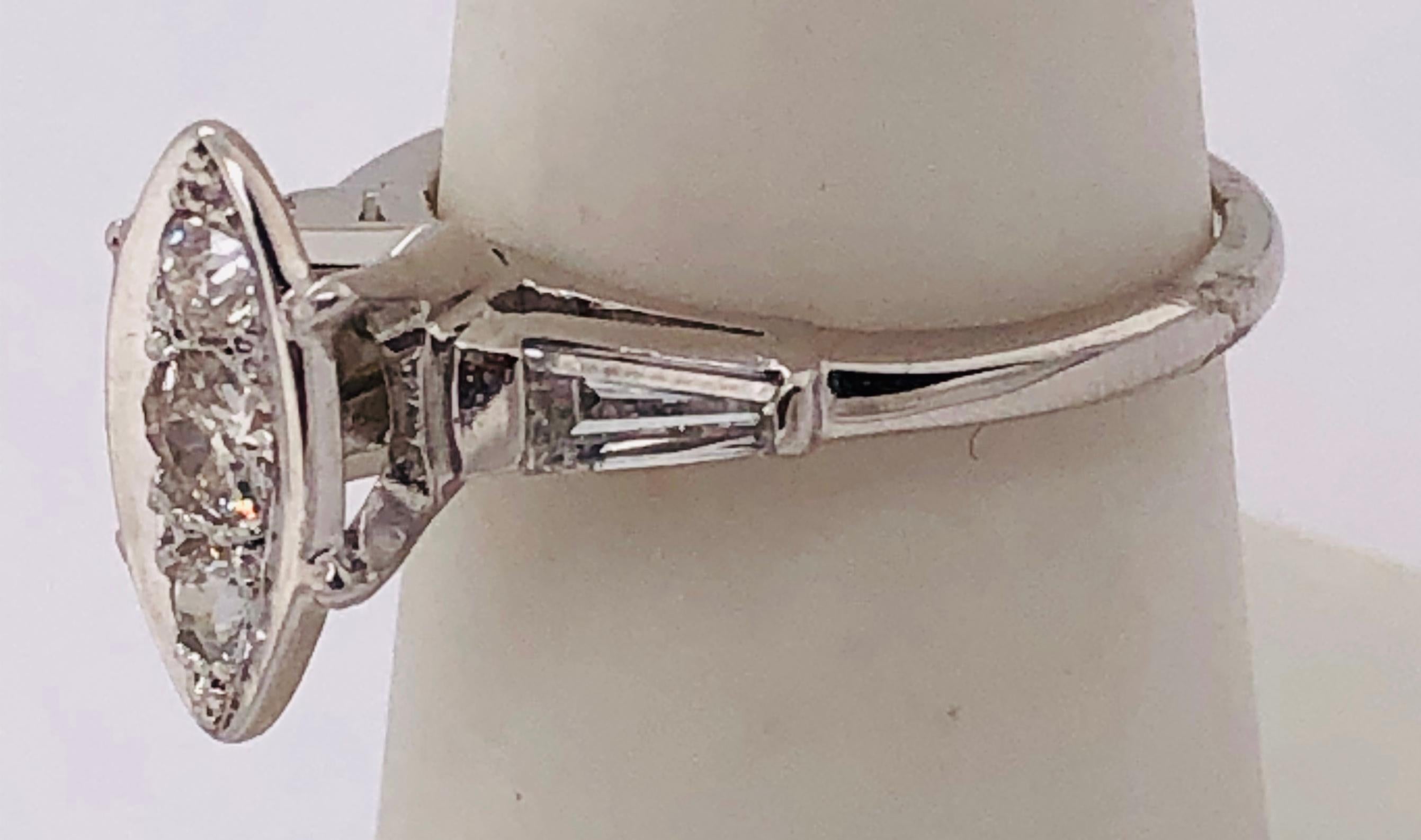 14 Karat White Gold Engagement Ring with Round and Baguette Cut Diamonds For Sale 1