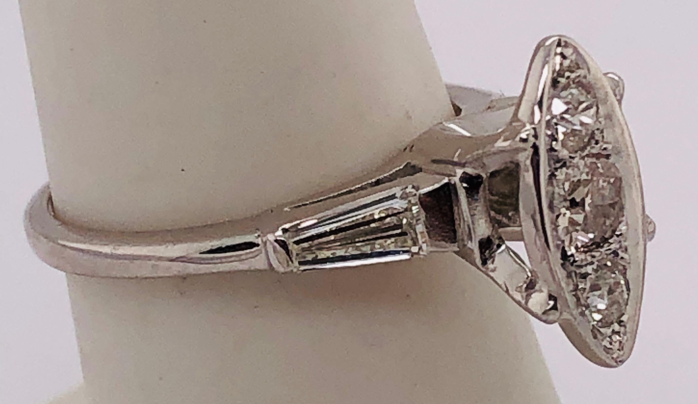 14 Karat White Gold Engagement Ring with Round and Baguette Cut Diamonds For Sale 2