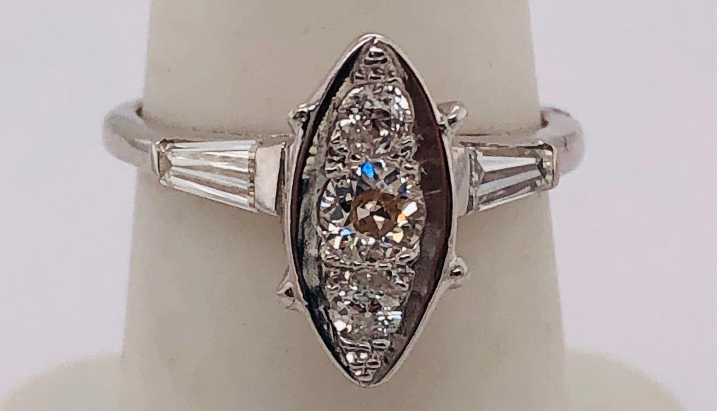 14 Karat White Gold Engagement Ring with Round and Baguette Cut Diamonds For Sale 3
