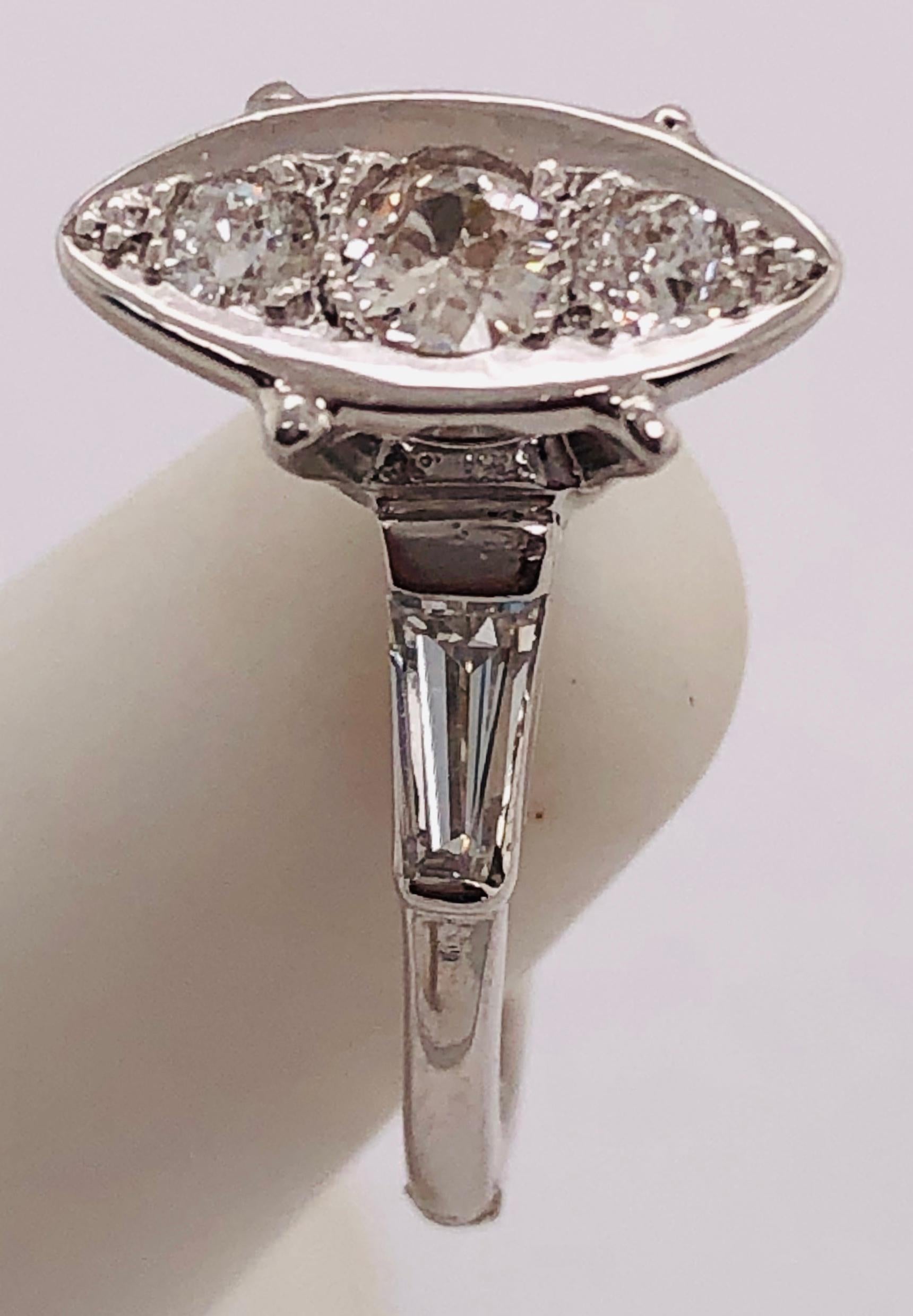14 Karat White Gold Engagement Ring with Round and Baguette Cut Diamonds For Sale 4