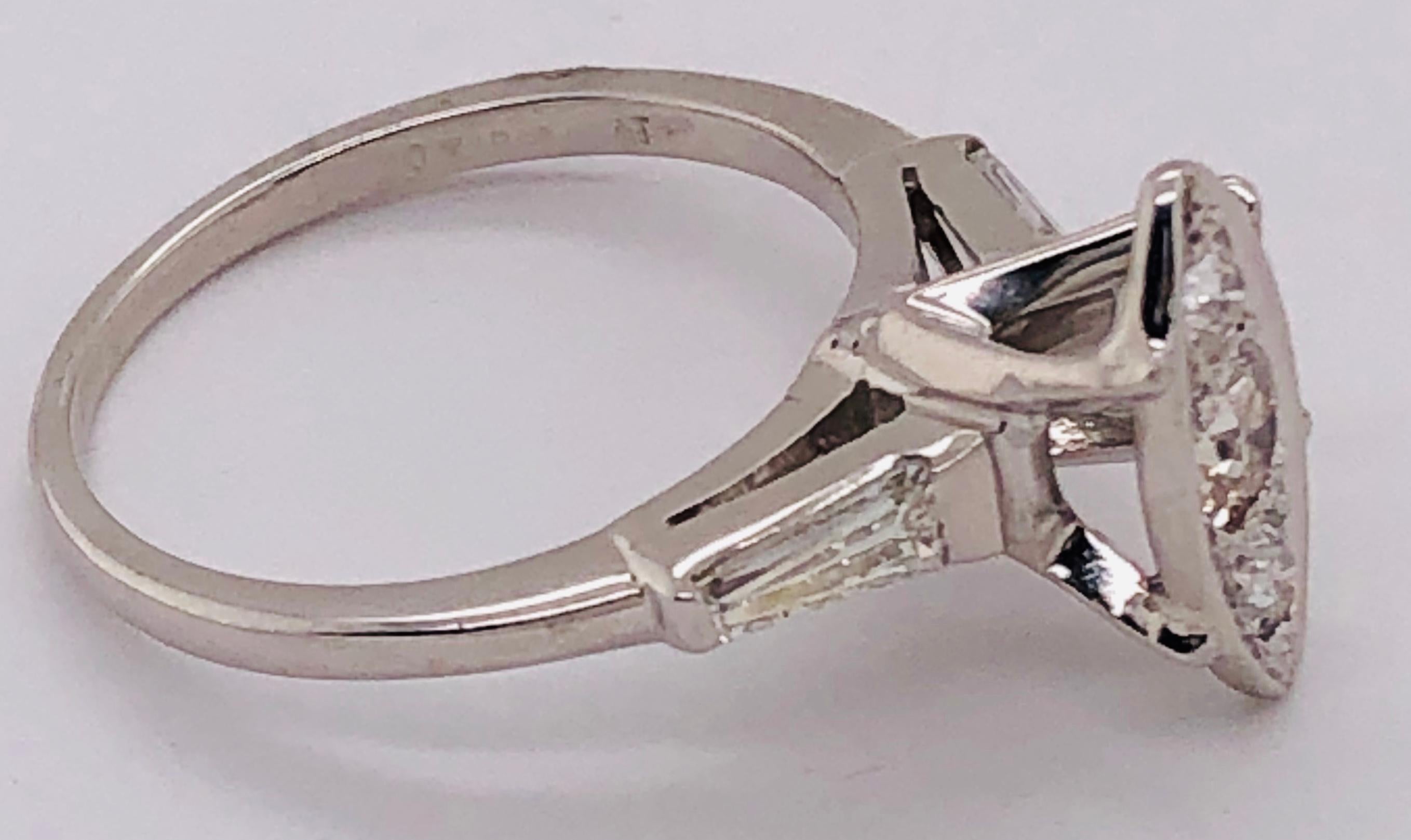 14 Karat White Gold Engagement Ring with Round and Baguette Cut Diamonds For Sale 5