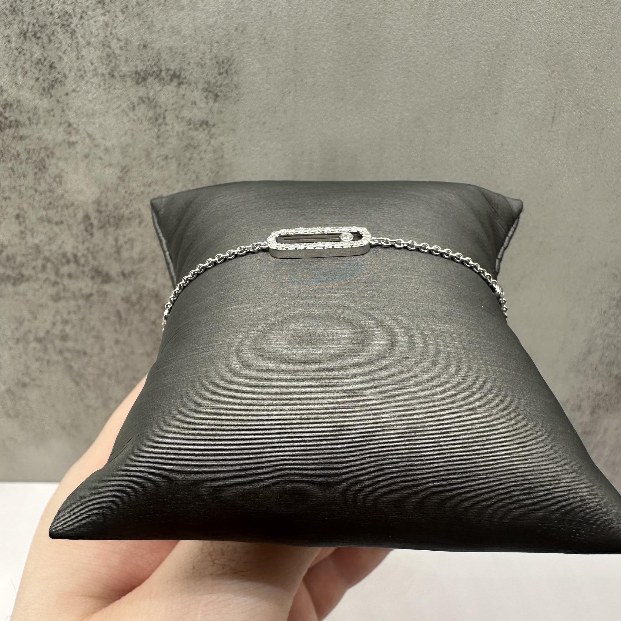 This stunning 14kt White Gold Floating Style Diamond Bracelet features 0.30ctw of natural HI I1 round diamonds, offering a brilliant sparkle. With a 7-inch length, it fits comfortably on most wrists, and the lobster clasp ensures a secure fit.