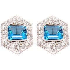 14 Karat White Gold French Back Huggie Earrings with Blue Topaz