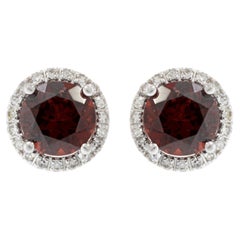 Boucles d'oreilles halo en or blanc 14KT grenat et diamant