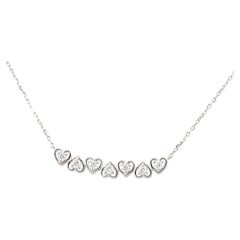 14KT White Gold Graduated Round Diamond Heart Design Necklace