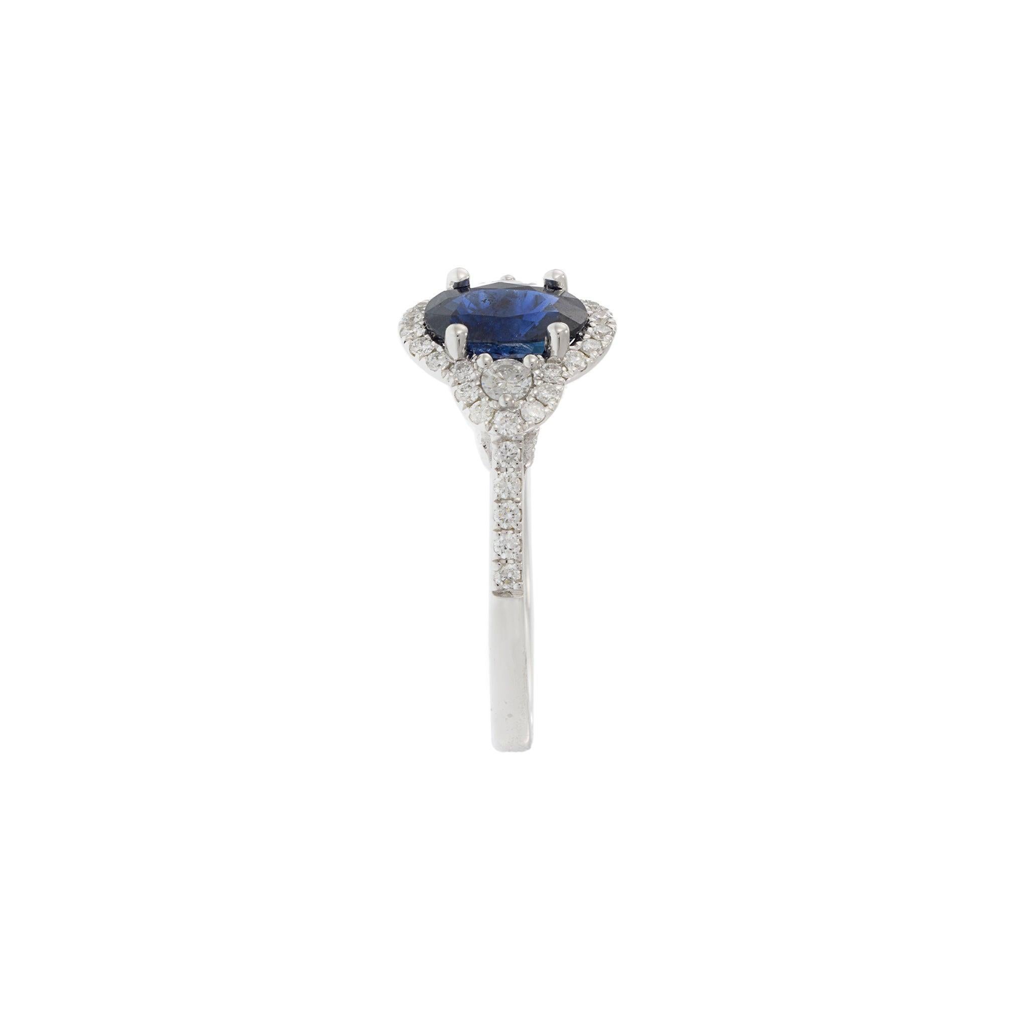 14KT White Gold Halo Ring Featuring Oval Sapphire & Diamonds In New Condition For Sale In New York, NY