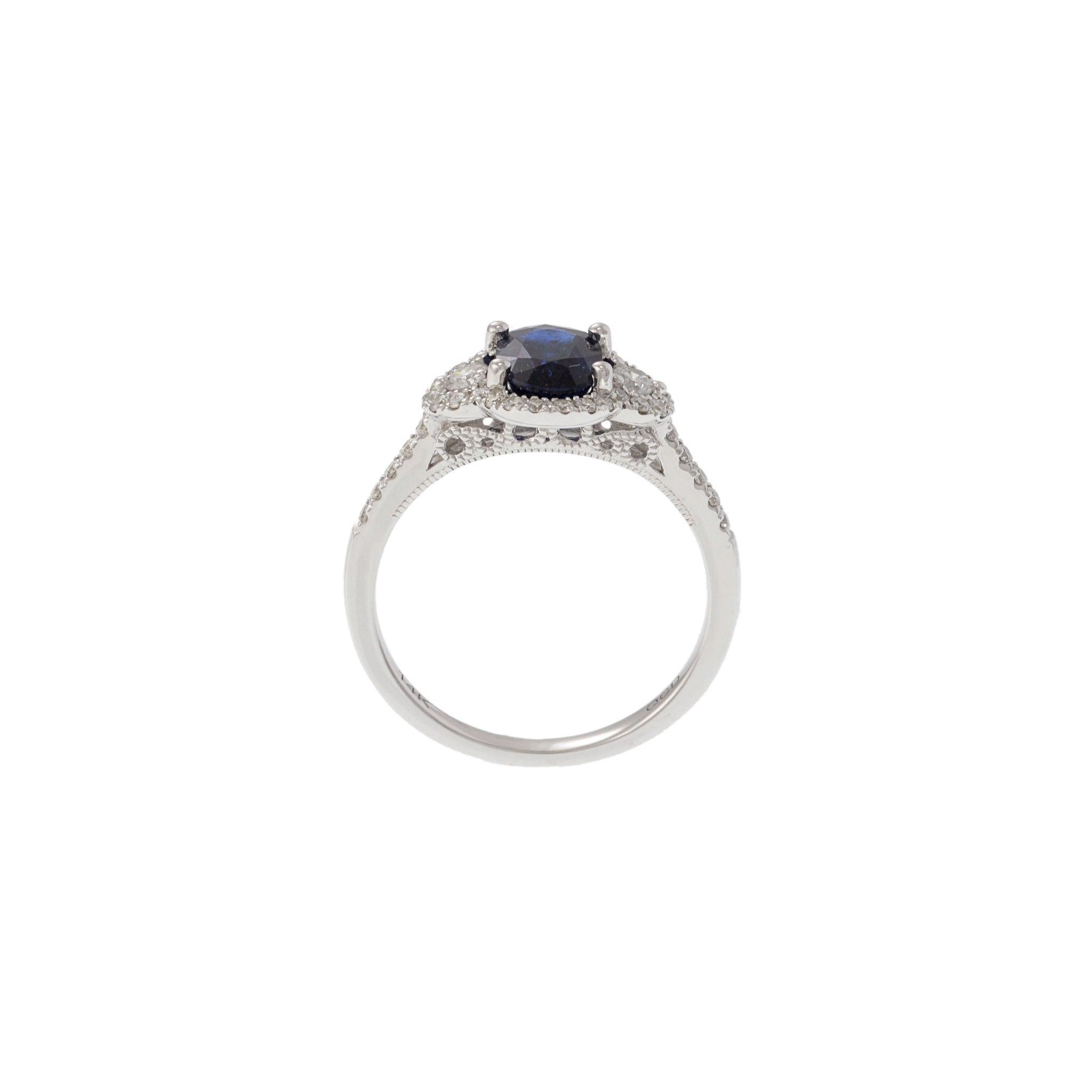 14KT White Gold Halo Ring Featuring Oval Sapphire & Diamonds For Sale 1
