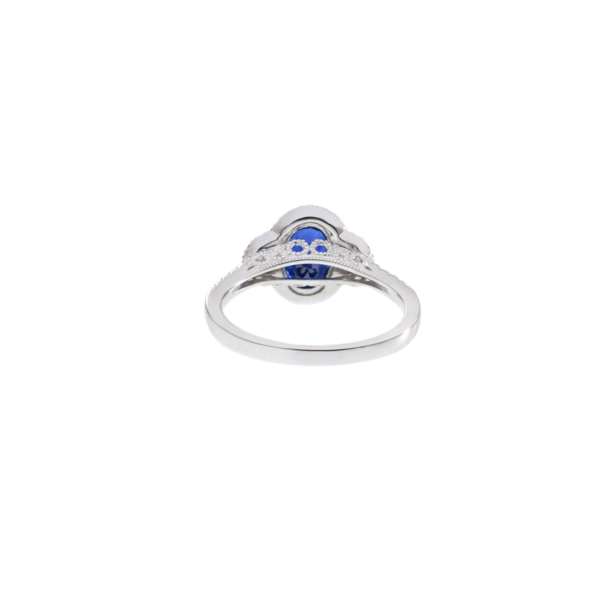 14KT White Gold Halo Ring Featuring Oval Sapphire & Diamonds For Sale 2