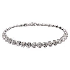 Bracciale tennis in oro bianco 14KT con diamanti a forma di cuore, 4,90 carati