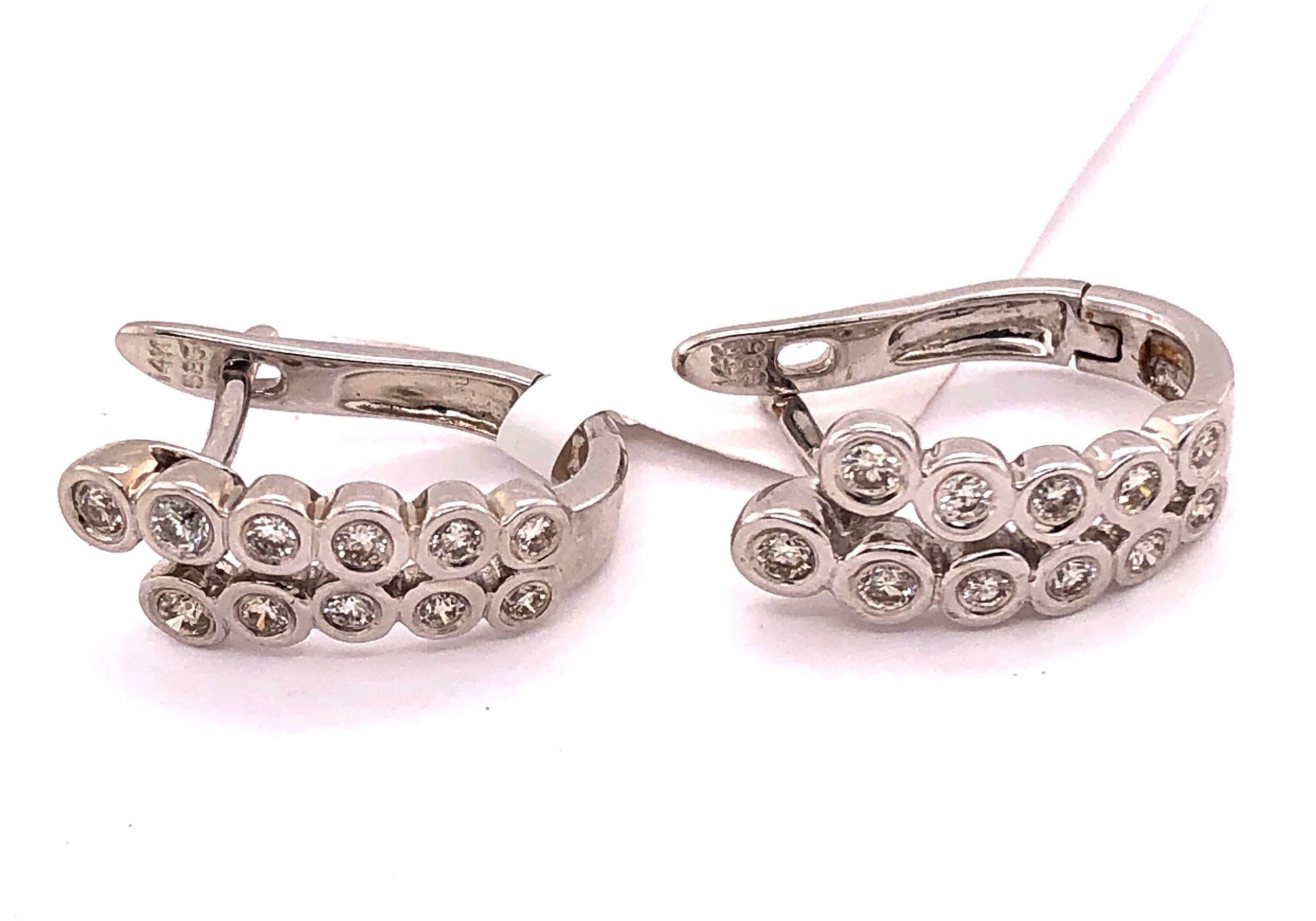 14Kt Hoop Latch Back Diamond Earrings 4.88 grams total weight
22 diamonds .50TDW
