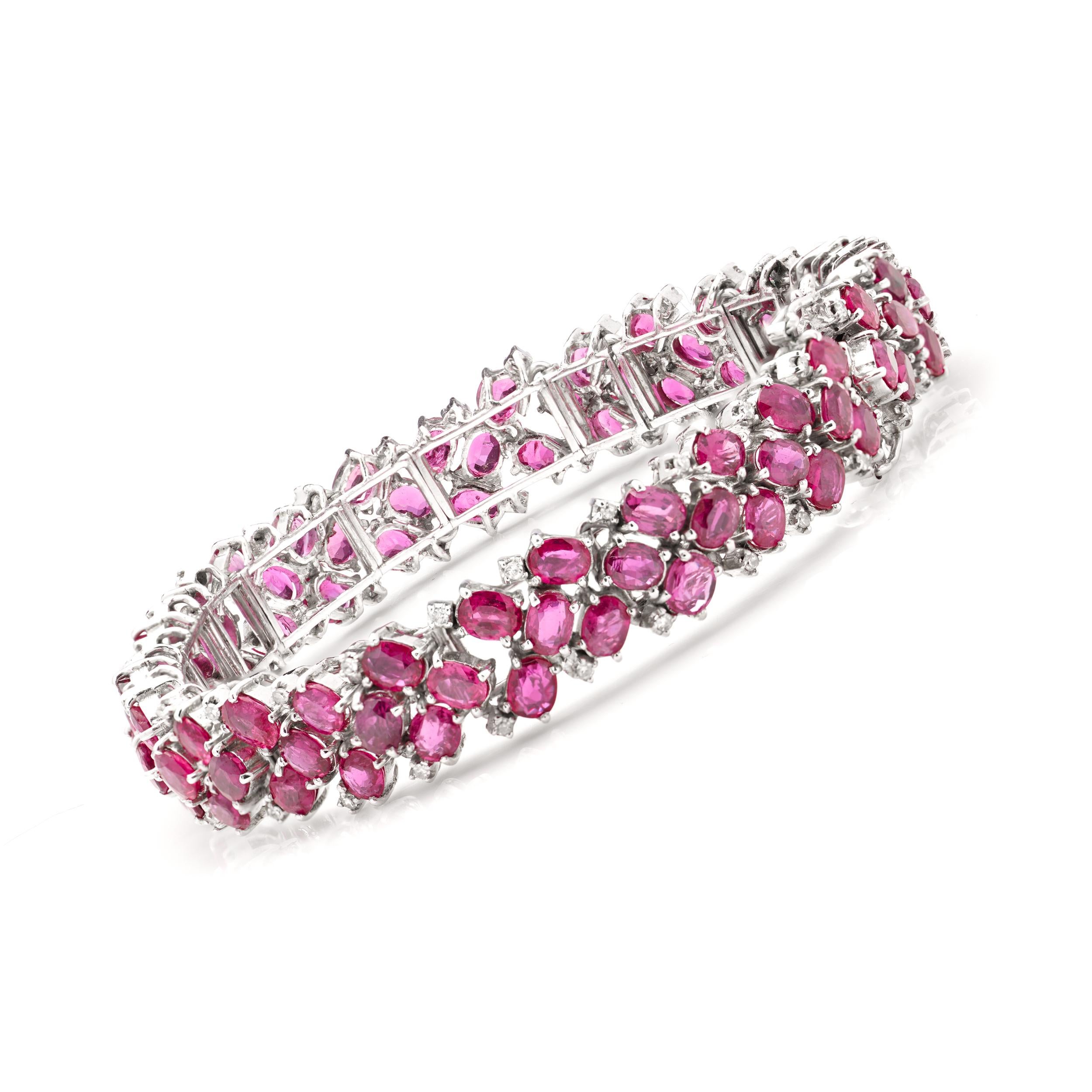 Women's 14kt. white gold link bracelet set with 22.5 carats of oval faceted rubies  For Sale