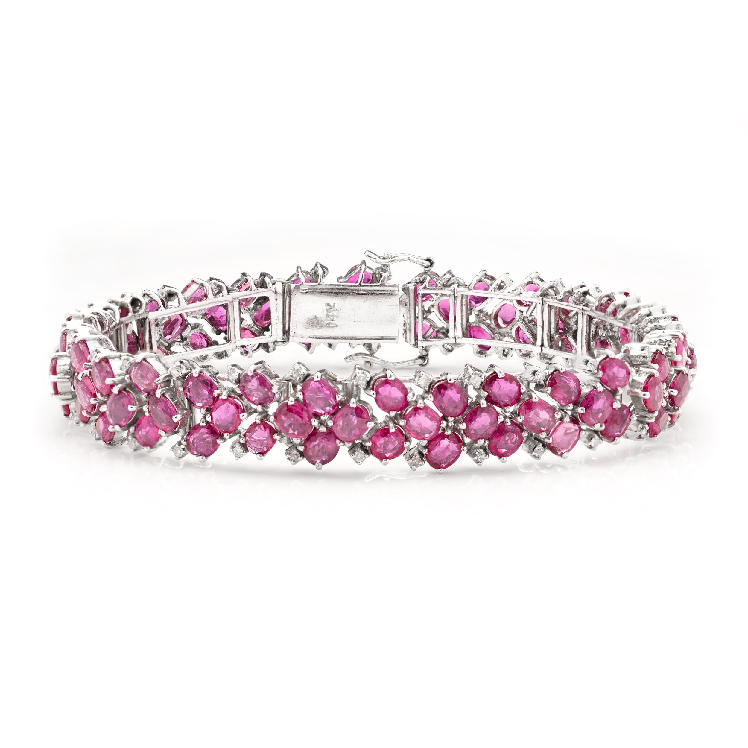14kt. white gold link bracelet set with 22.5 carats of oval faceted rubies  For Sale 1