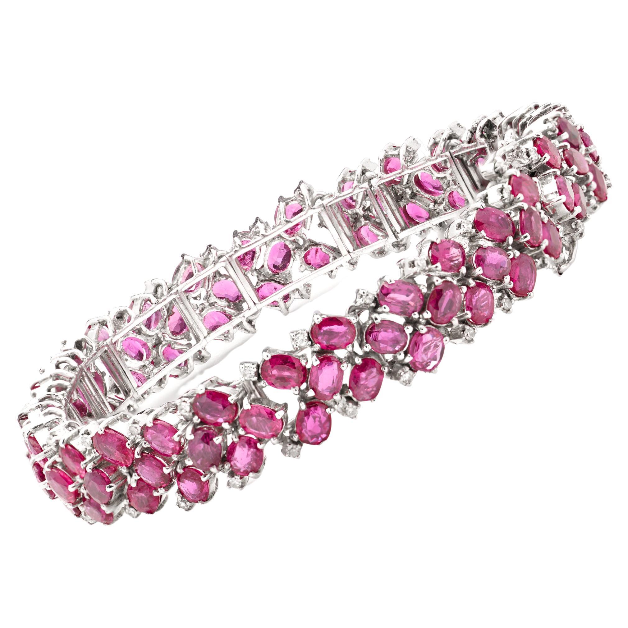 14kt. white gold link bracelet set with 22.5 carats of oval faceted rubies  For Sale