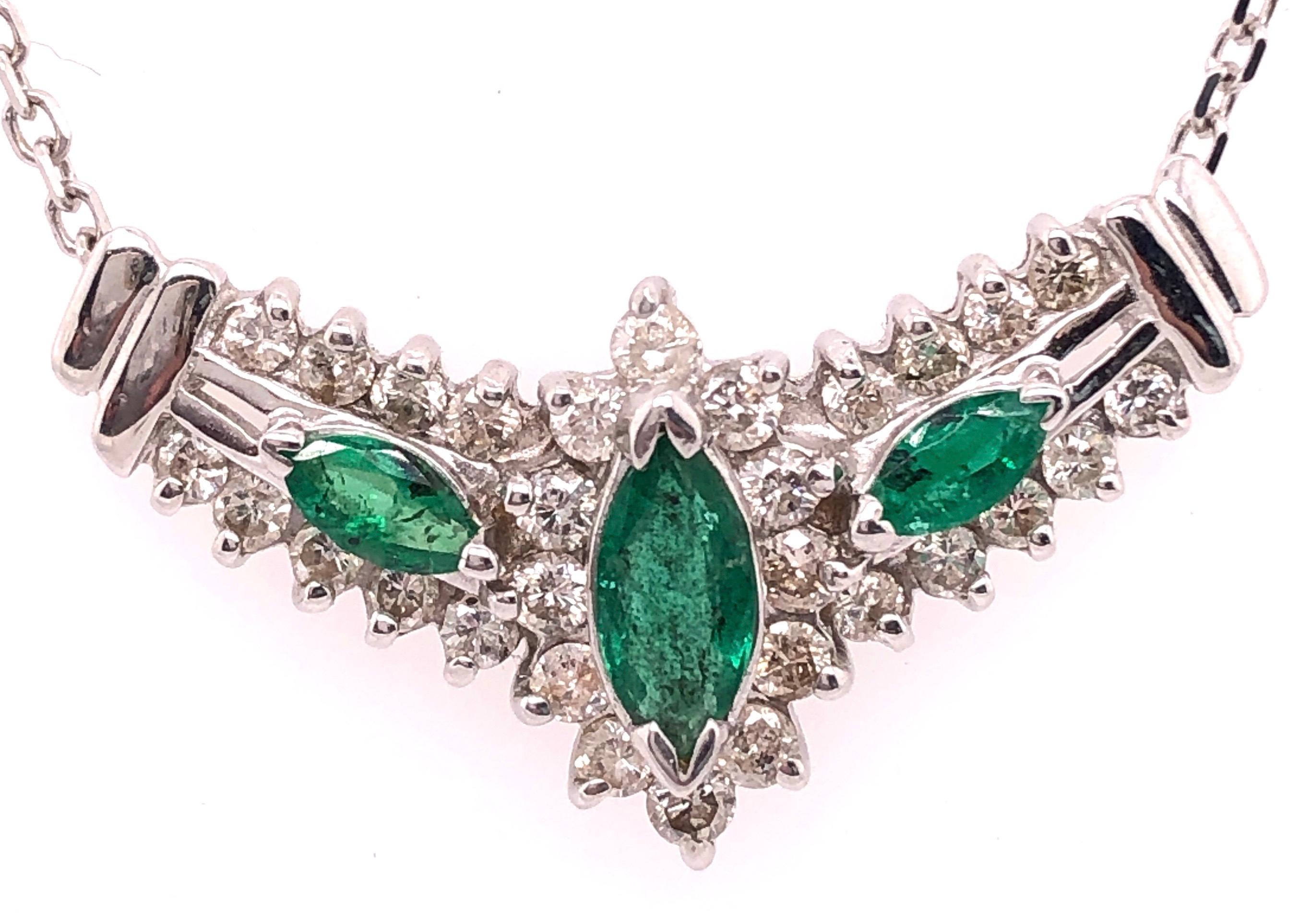 14Kt White Gold Necklace 18 inch With Soldered Diamond and Emerald Pendant
1.25 Total Diamond Weight
0.25 Total Emerald Weight
4.53 grams total weight.