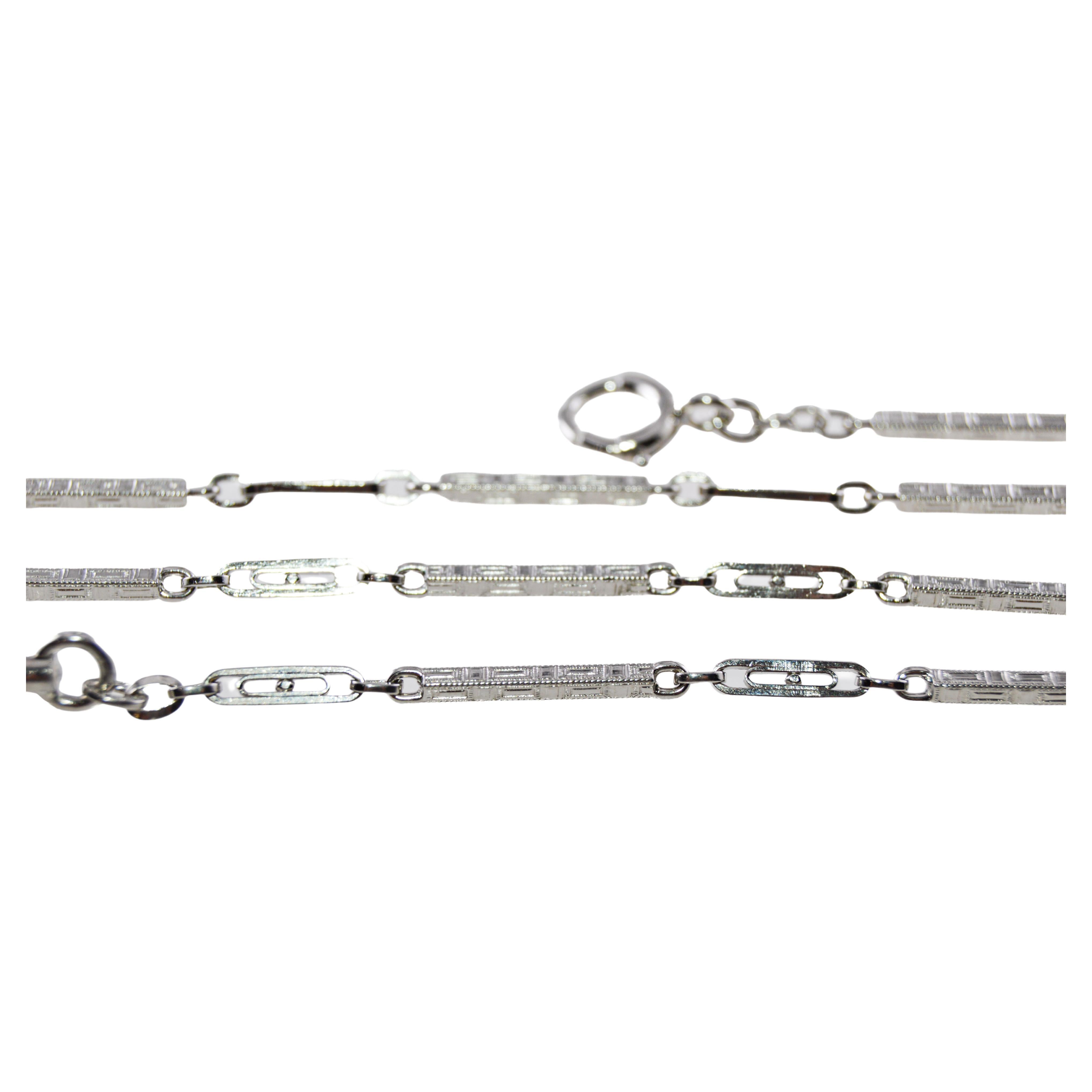 METAL / MATERIAL: 14Kt White Gold
CIRCA / YEAR: 1920's or 30's 
ATTACHMENT / LENGTH: 13.5 Inches in Length

This is a great looking hand made necklace or bracelet, or a pocket watch chain. Each link is hand constructed with alternating links. We