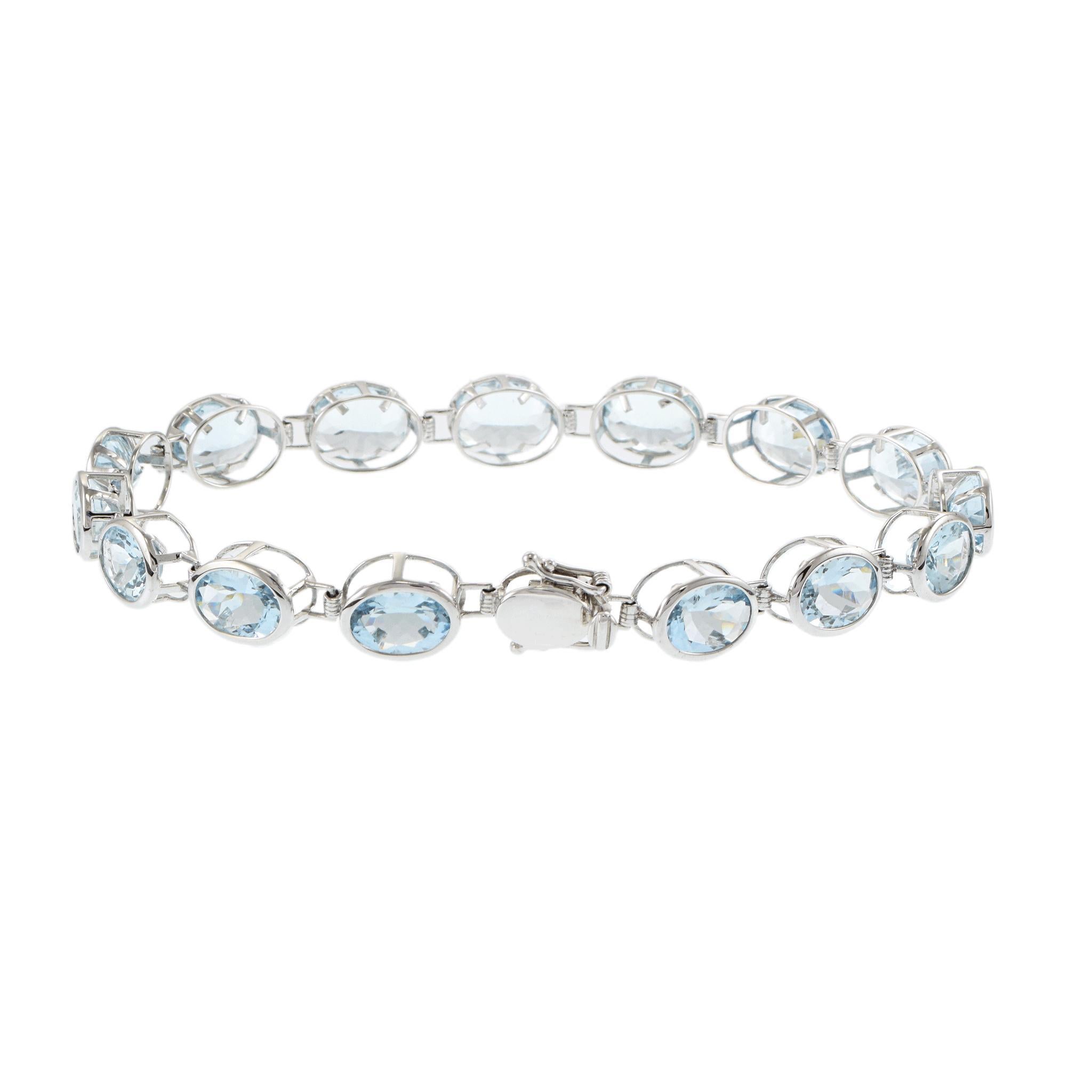 Pulsera de tenis de aguamarina ovalada de oro blanco de 14 quilates Corte oval en venta