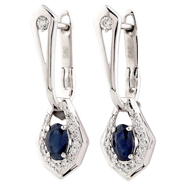 14KT White Gold Oval Blue Sapphire and Diamond Drop Earrings.