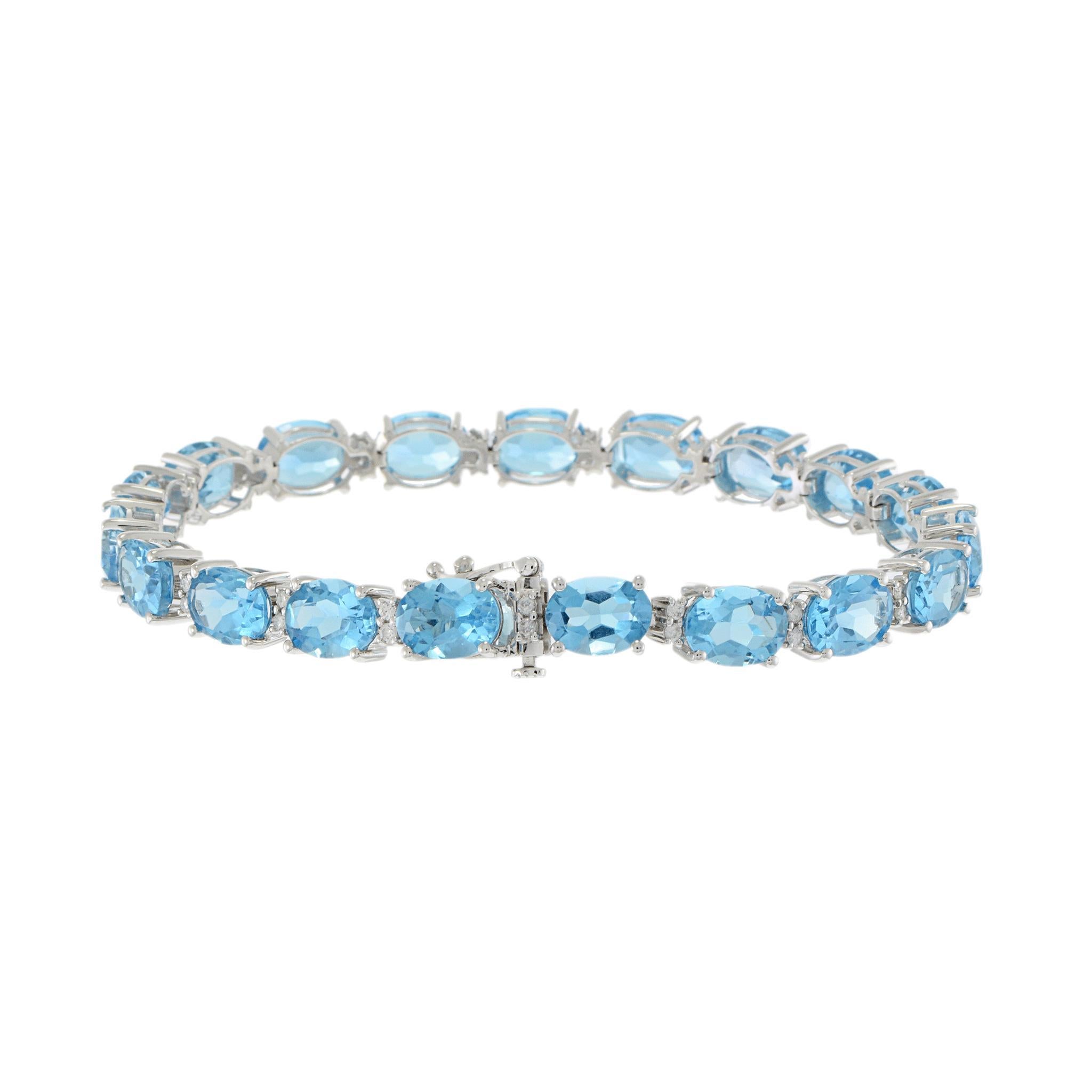 Bracciale in oro bianco 14KT con topazio blu ovale e diamanti In condizioni Nuovo in vendita a New York, NY