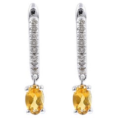 Boucles d'oreilles Huggie en or blanc 14KT avec citrine ovale et diamants en pavé