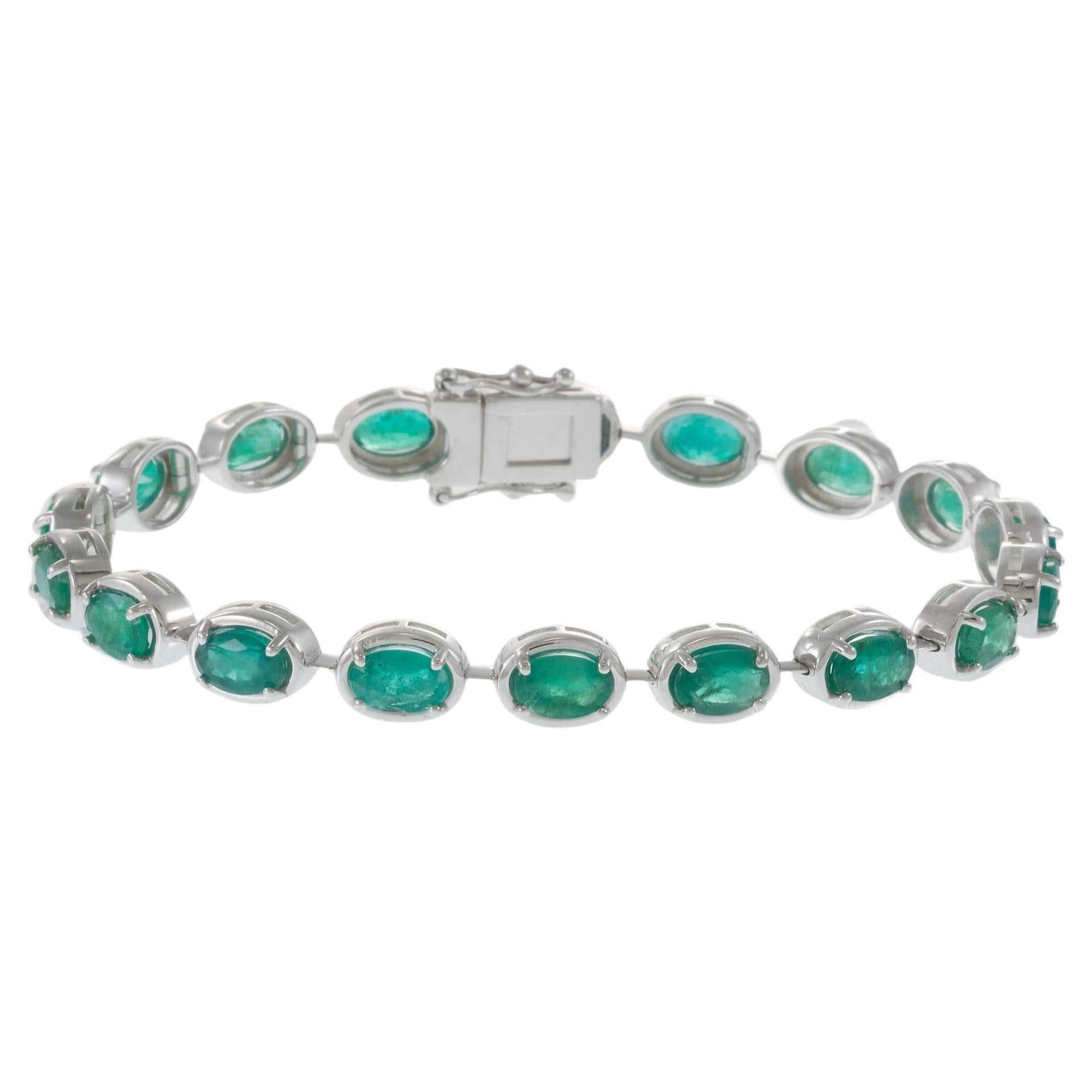 Bracelet en or blanc 14KT avec émeraude de taille ovale