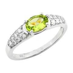 14KT White Gold Oval Peridot and Diamond Ring