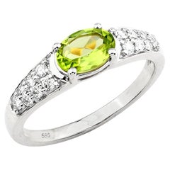 14KT White Gold Oval Peridot and Diamond Ring