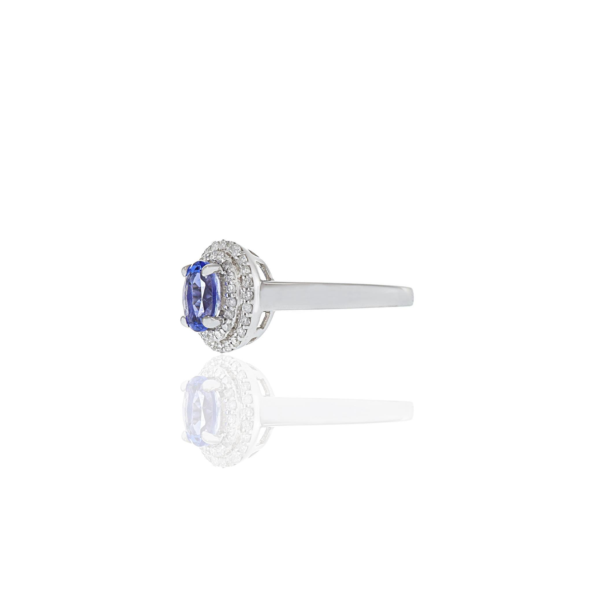 da uomo o donna Anello aureola ovale con tanzanite e diamante in oro bianco 14KT in vendita