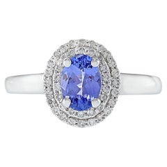 14KT White Gold Oval Tanzanite And Diamond Halo Ring