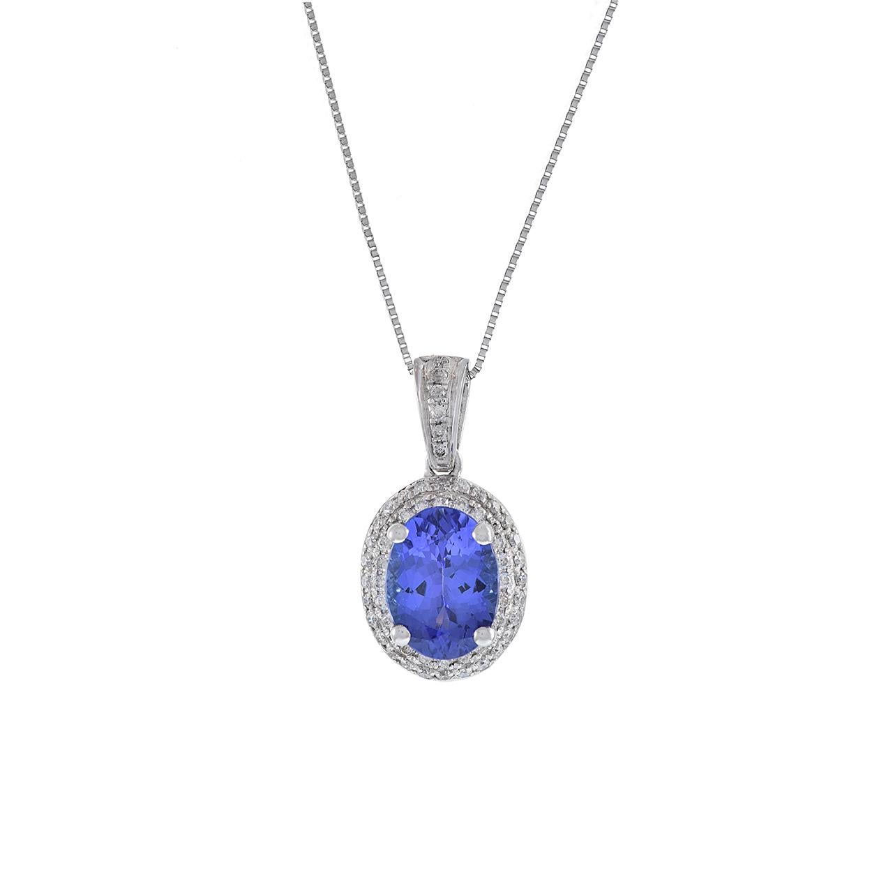 Presenting our stunning 14KT white Gold Tanzanite Double Halo Diamond Pendant with Chain. This exquisite piece features a brilliant oval-cut tanzanite weighing 1.50 carats, elegantly encircled by a double halo of shimmering round-cut diamonds