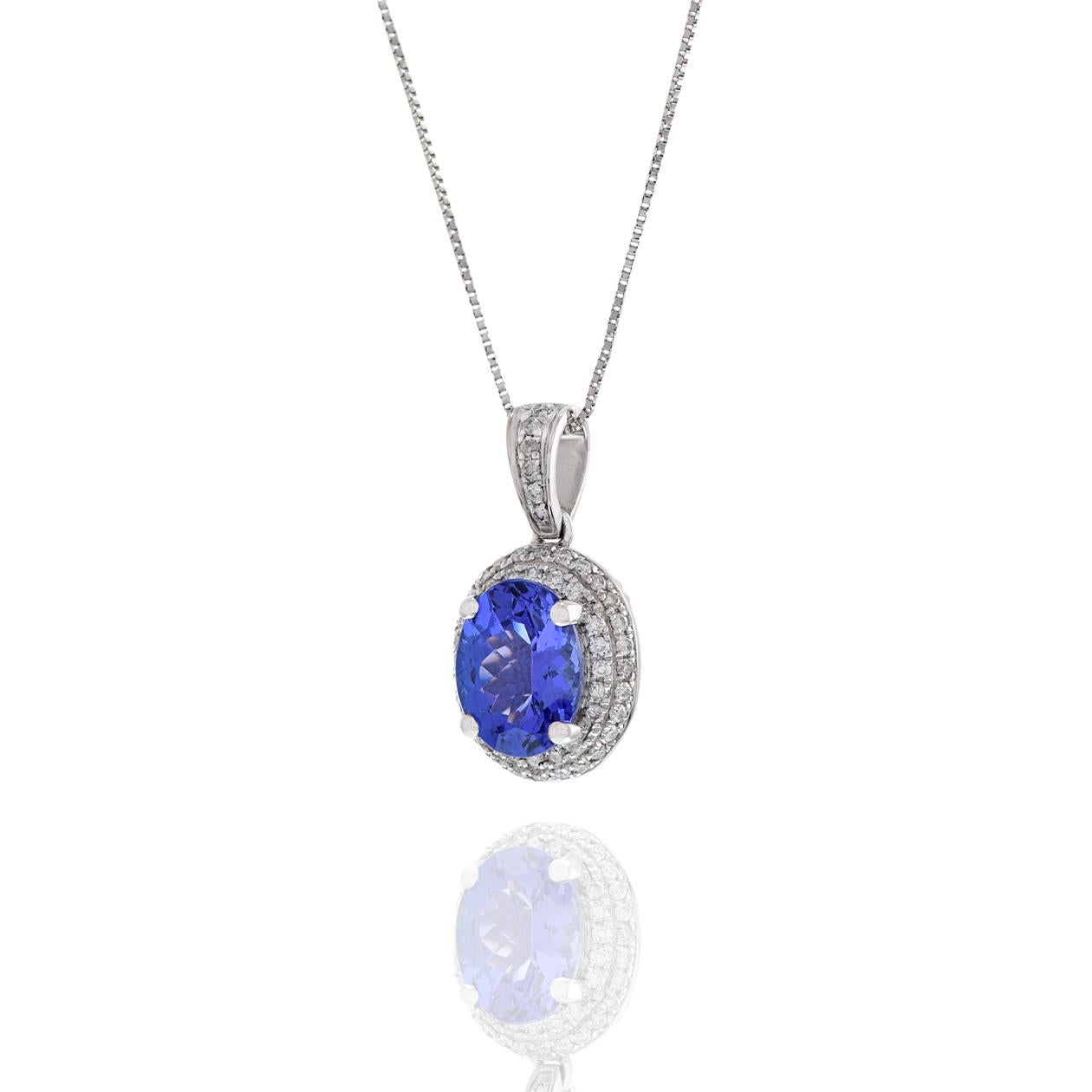 Oval Cut 14KT White Gold Oval Tanzanite And Diamond Pendant For Sale
