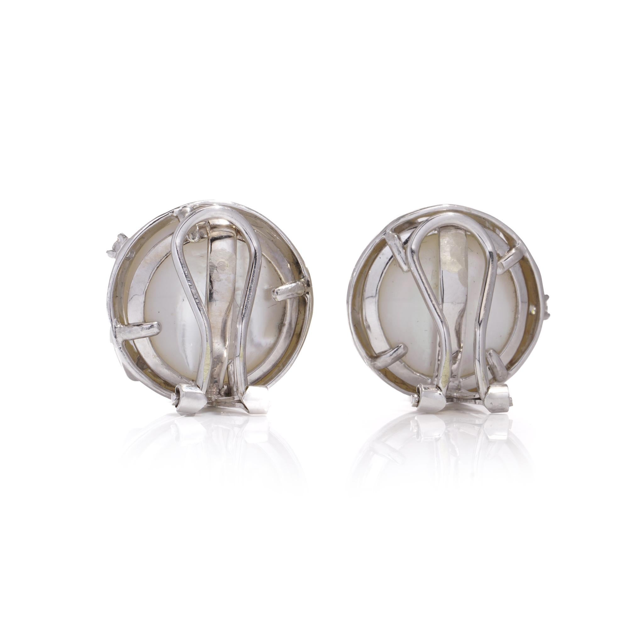 Women's 14kt. white gold pair of Mabe pearl and diamond earrings  For Sale