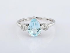 14KT White Gold Pear-Cut Sky Blue Topaz and Diamond 2.18 Cts Accent Ring