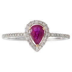 14KT White Gold Pear Shape Ruby and Diamond Halo Ring
