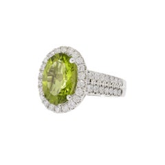 14KT Ring aus Weißgold mit Peridot und Diamant