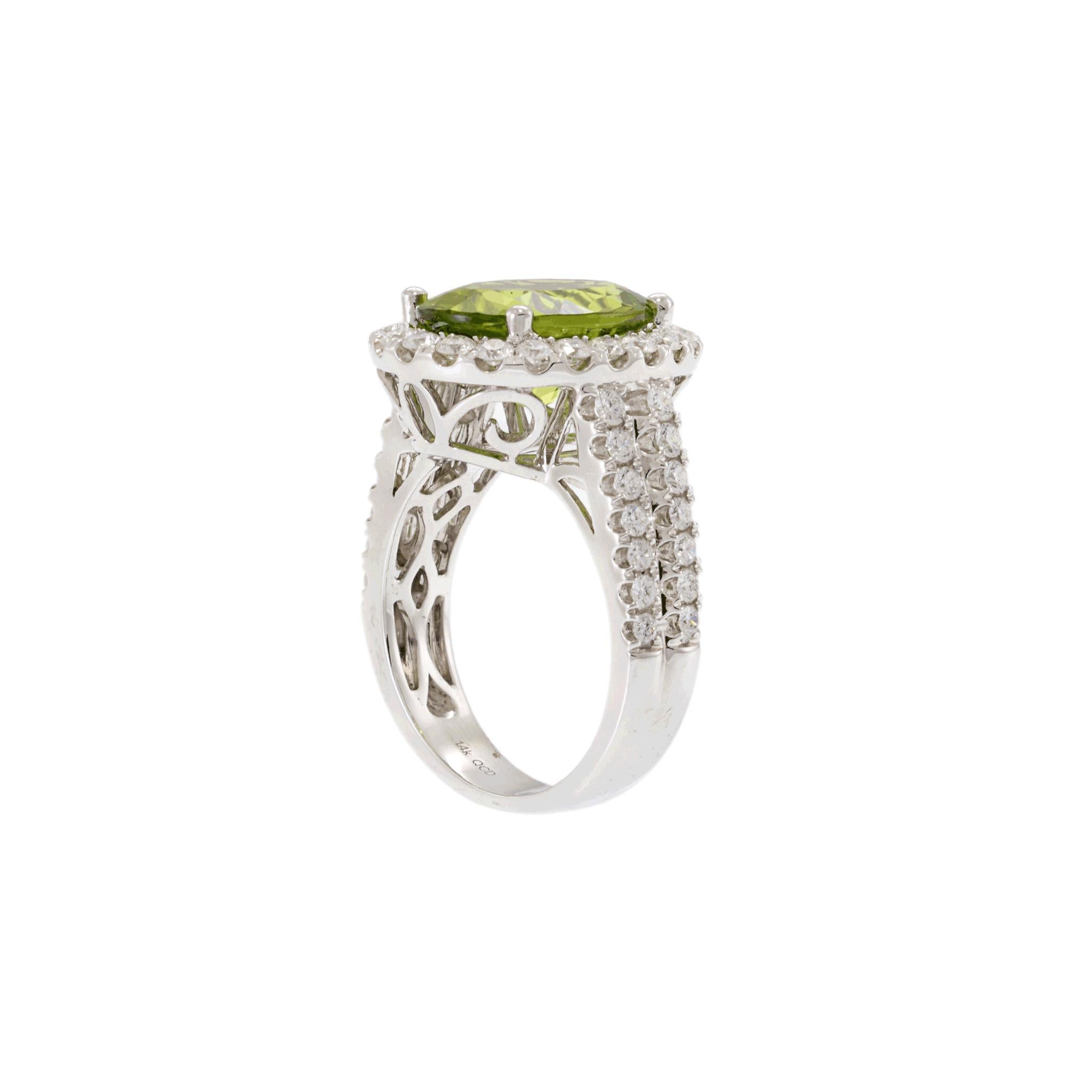 Oval Cut 14KT White Gold Peridot and Diamond Ring For Sale